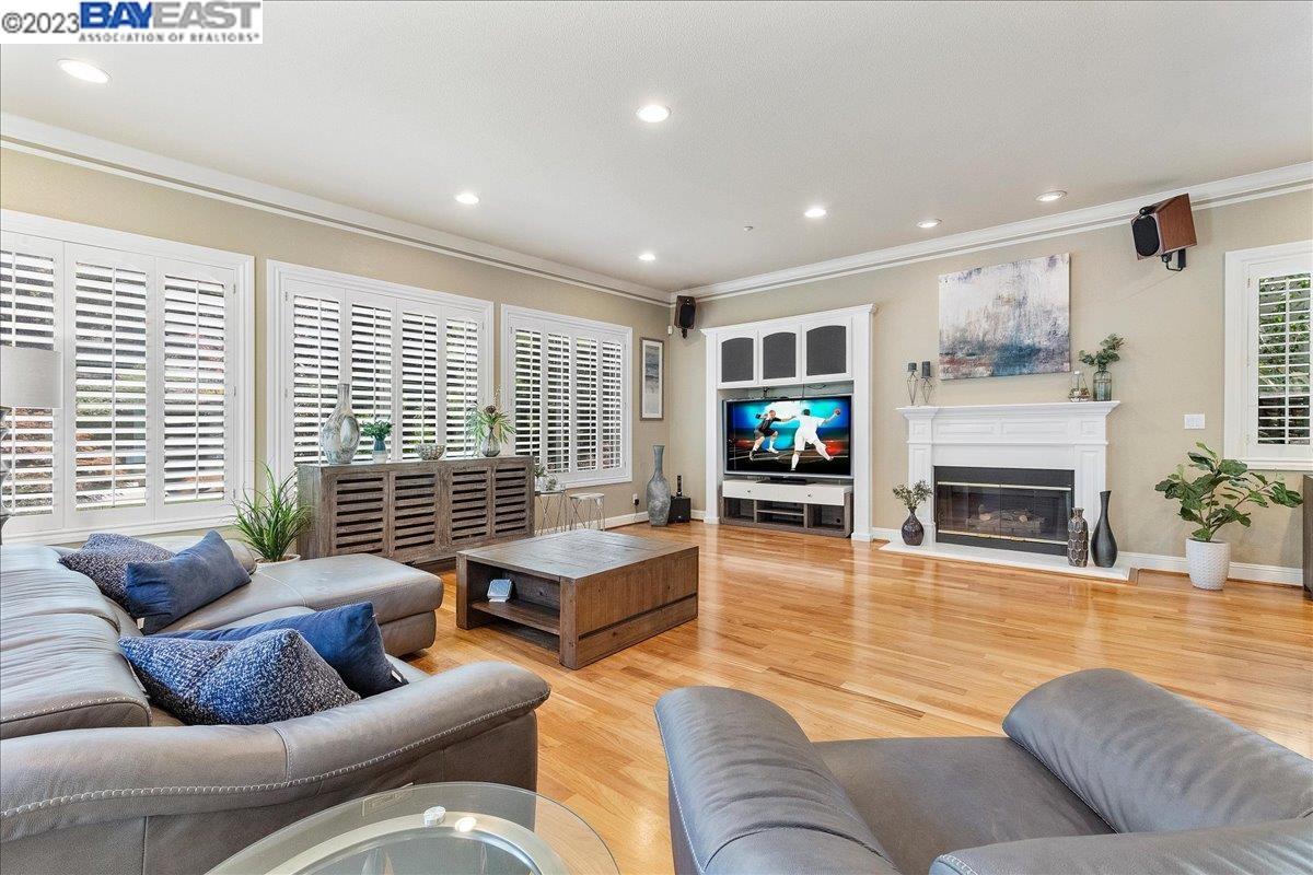 Undisclosed Address San Ramon, CA 94583 - Photo 32 of 57 a living room with furniture a fireplace and a flat screen tv