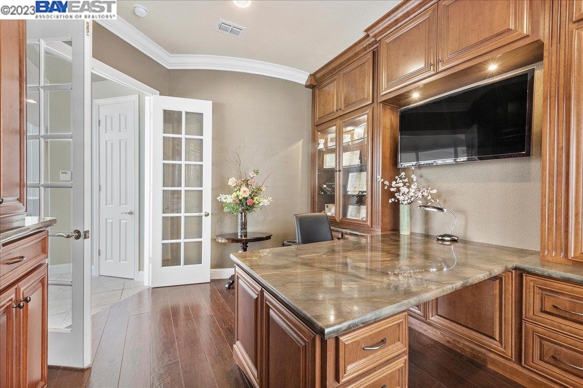Undisclosed Address San Ramon, CA 94583 - Photo 36 of 57 a kitchen with a sink a microwave and wooden floor