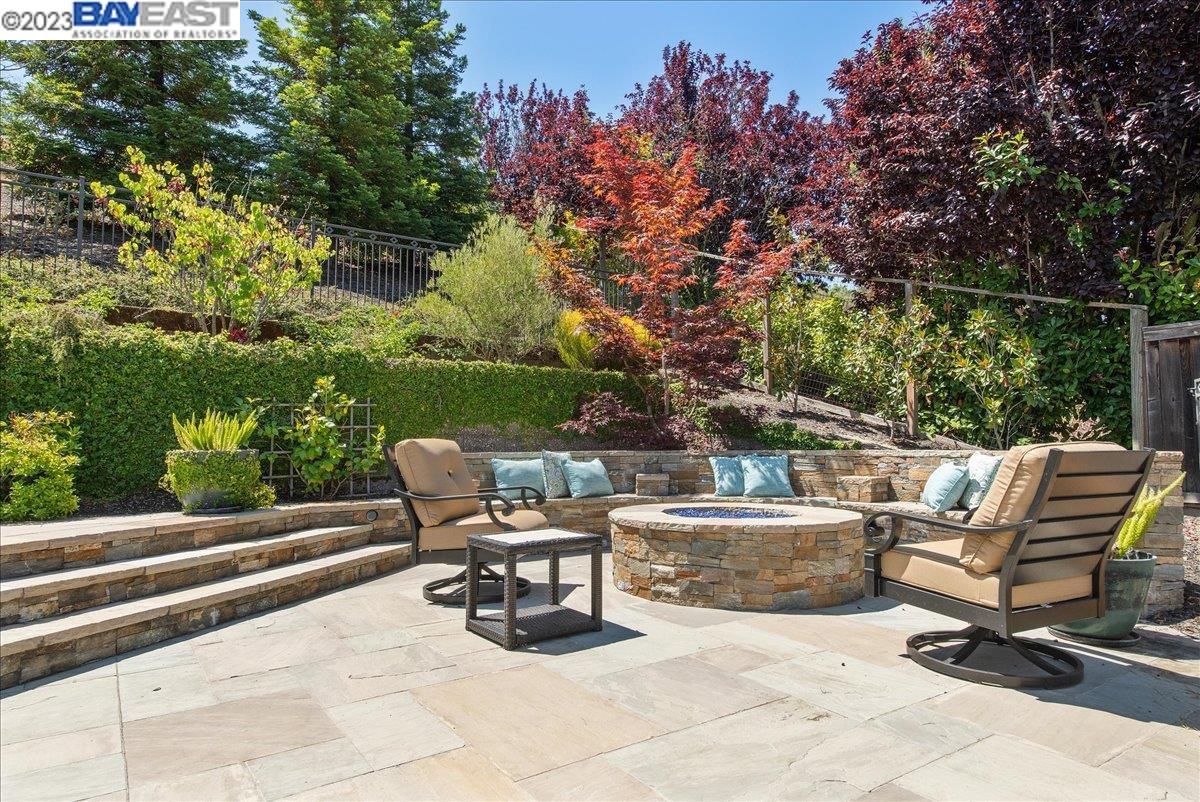 Undisclosed Address San Ramon, CA 94583 - Photo 50 of 57 a view of backyard with seating space and trees