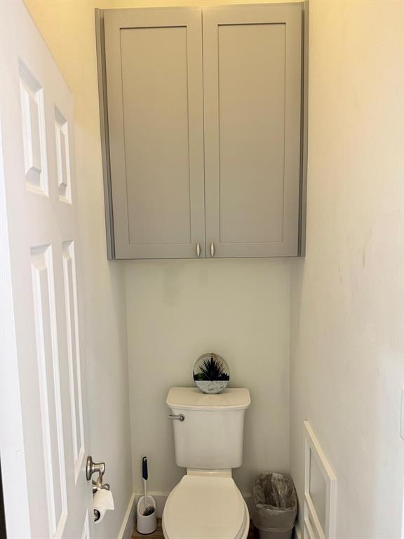 2300 Berend Road Pilot Point, TX 76258 - Photo 28 of 39 Bathroom with toilet and baseboards