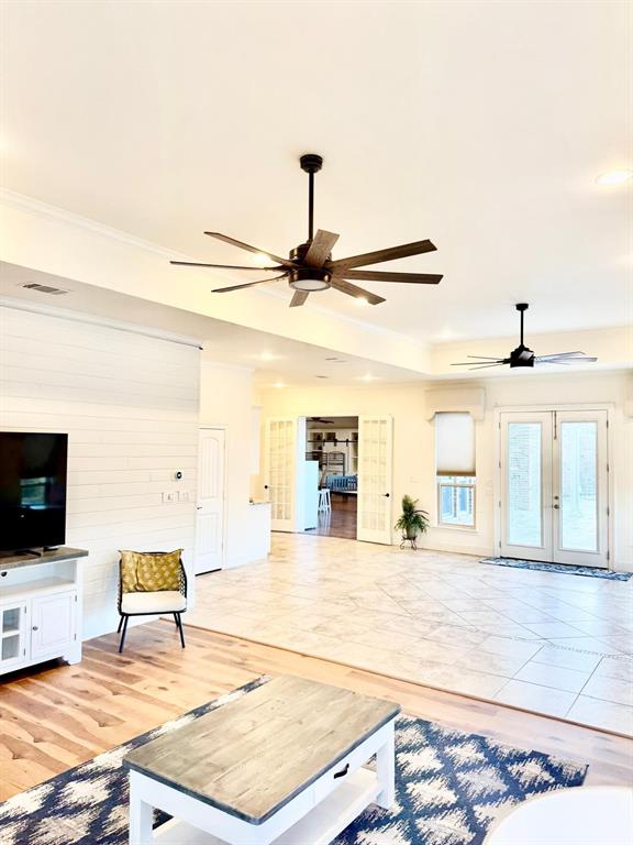 2300 Berend Road Pilot Point, TX 76258 - Photo 30 of 39 Unfurnished living room with recessed lighting, ceiling fan, light wood-type flooring, and french doors