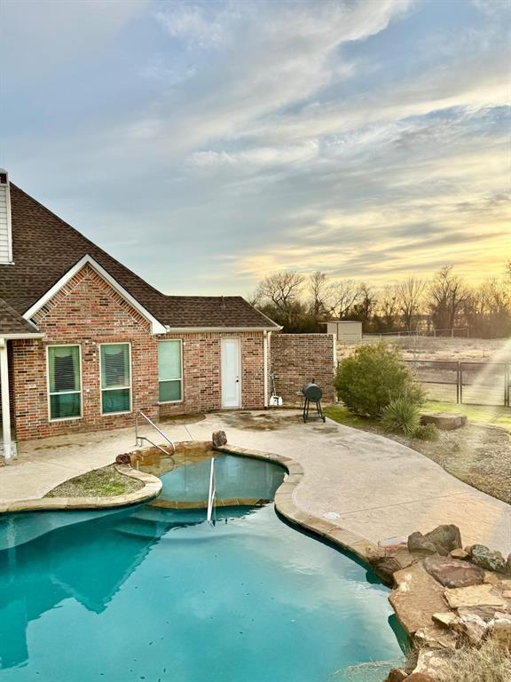 2300 Berend Road Pilot Point, TX 76258 - Photo 36 of 39 Swimming pool with a patio area and grilling area