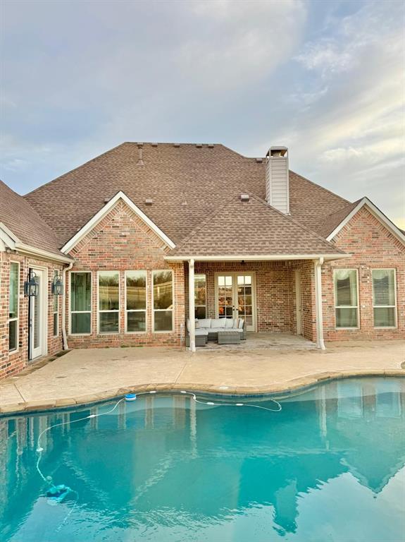 2300 Berend Road Pilot Point, TX 76258 - Photo 39 of 39 Swimming pool with a patio area and outdoor seating