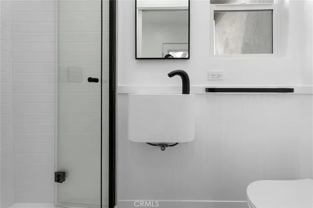 a bathroom with a sink and a toilet