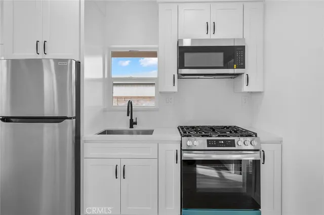 a view of a backyard of a house