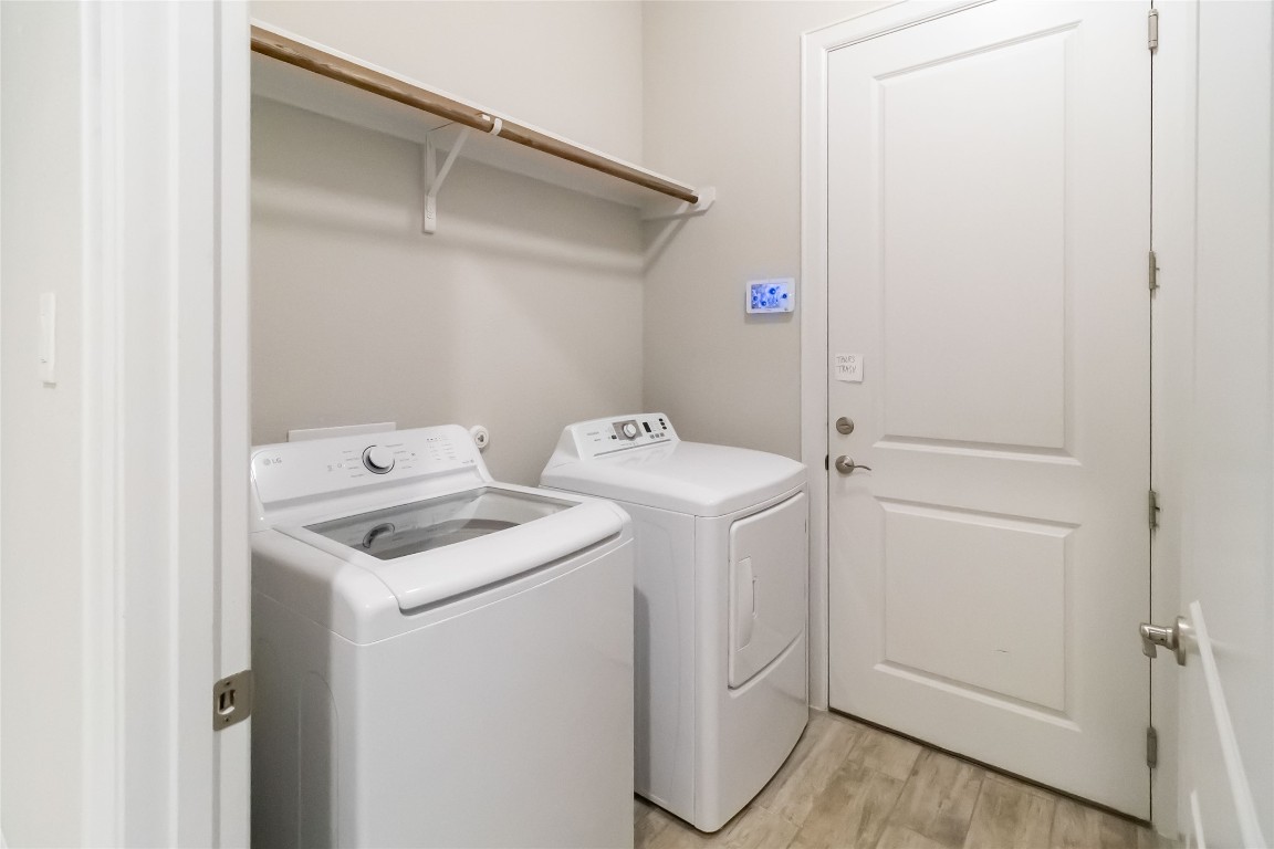 112 Barrel Bend Georgetown, TX 78628 - Photo 24 of 39 a utility room with dryer and washer
