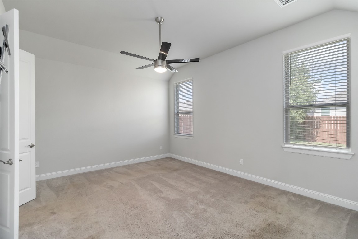 112 Barrel Bend Georgetown, TX 78628 - Photo 27 of 39 an empty room with a window and a fan