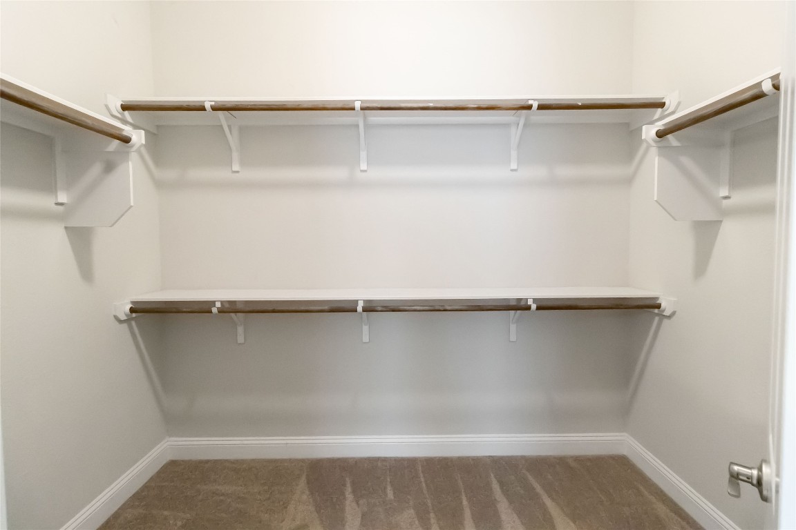 112 Barrel Bend Georgetown, TX 78628 - Photo 32 of 39 a close up view of an empty walk in closet