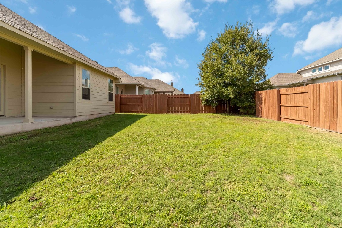112 Barrel Bend Georgetown, TX 78628 - Photo 39 of 39 a view of a backyard with large trees