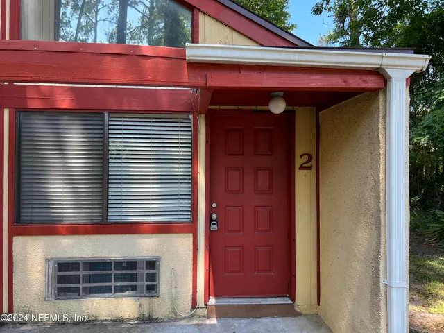 a front view of a house with windows