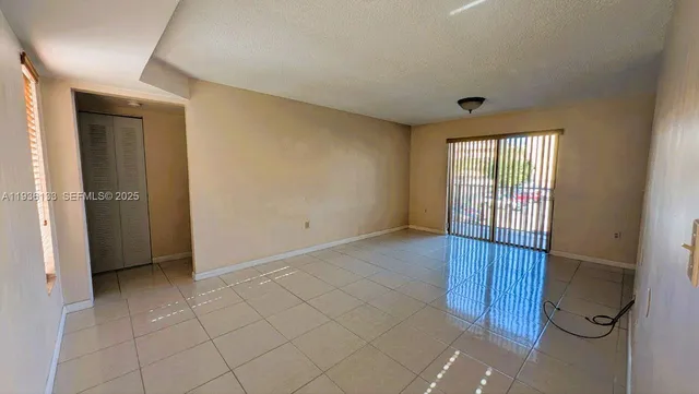 a view of an empty room with window