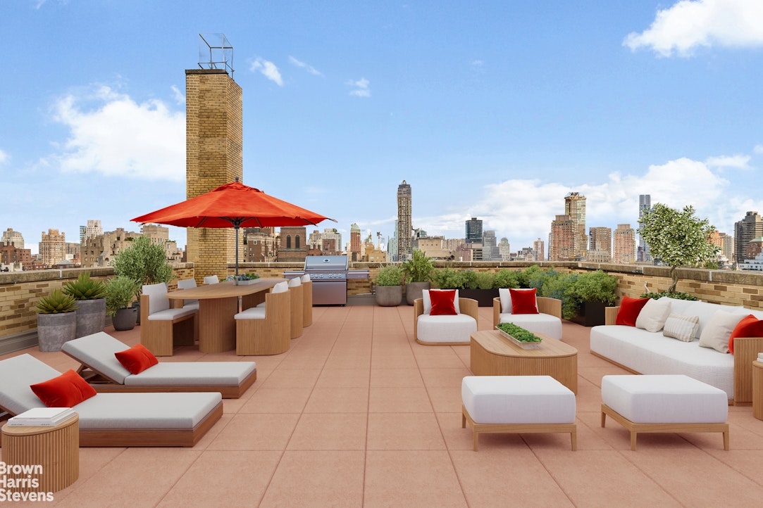 880 5th Avenue, Unit PHF Manhattan, NY 10021 - Photo 11 of 16 a view of a patio with couches and a table and chairs under an umbrella