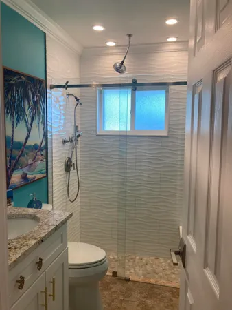 a view of bathroom with dual sinks