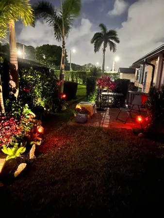 a view of a building with a yard