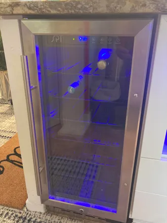 a kitchen with stainless steel appliances granite countertop a stove and a sink