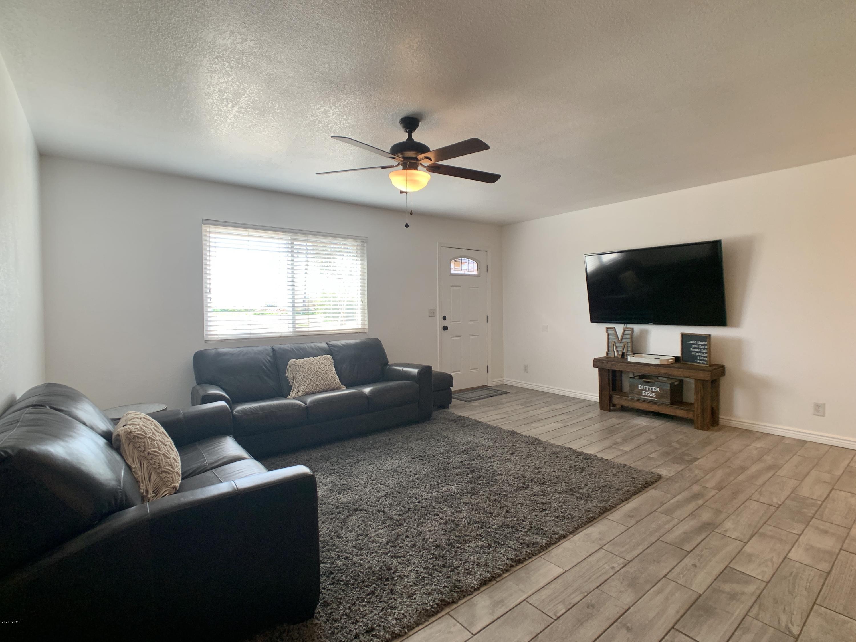 22232 West Lower Buckeye Road Buckeye, AZ 85326 - Photo 5 of 25 Living Room 1