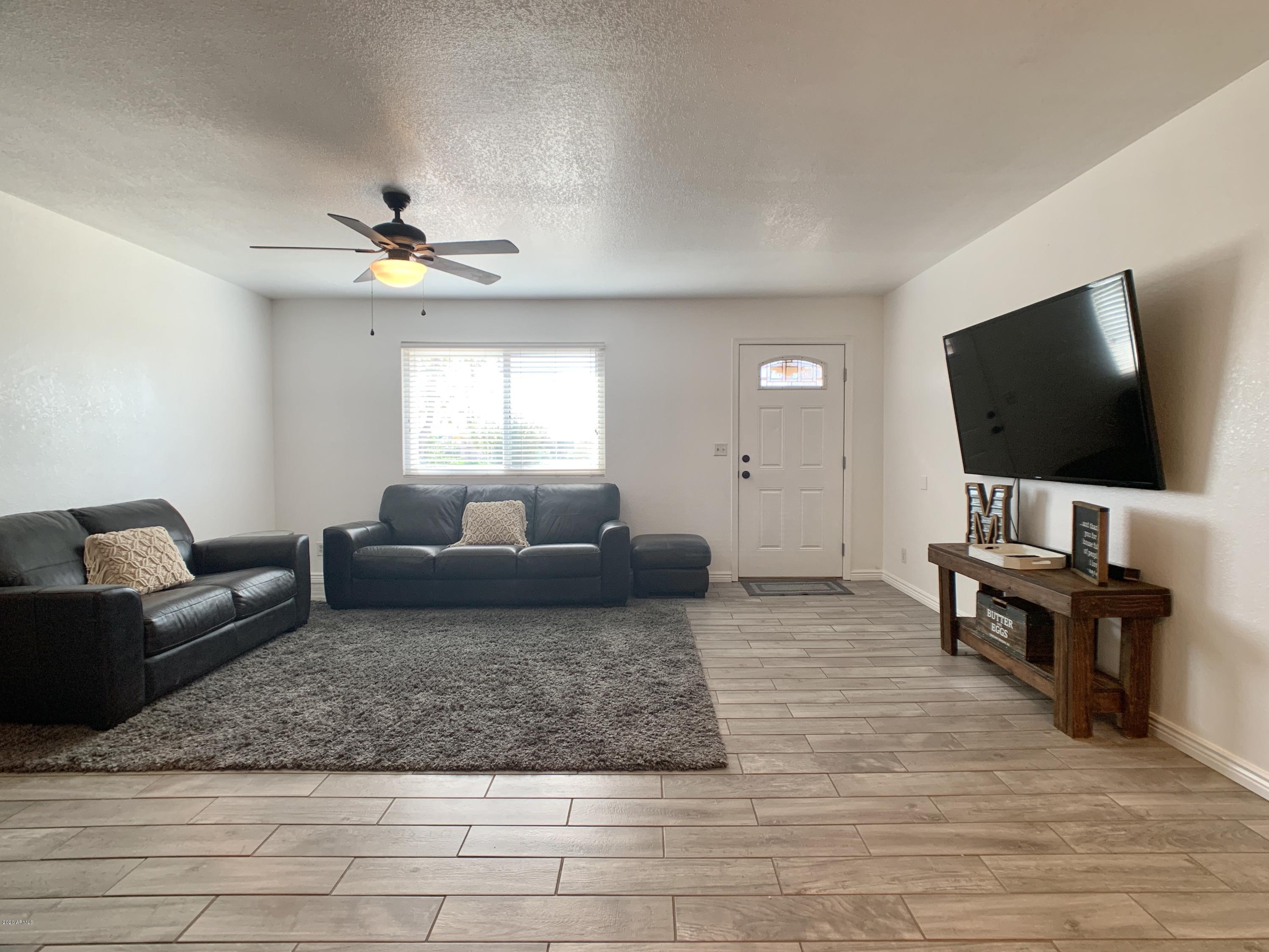 22232 West Lower Buckeye Road Buckeye, AZ 85326 - Photo 6 of 25 Living Room 2