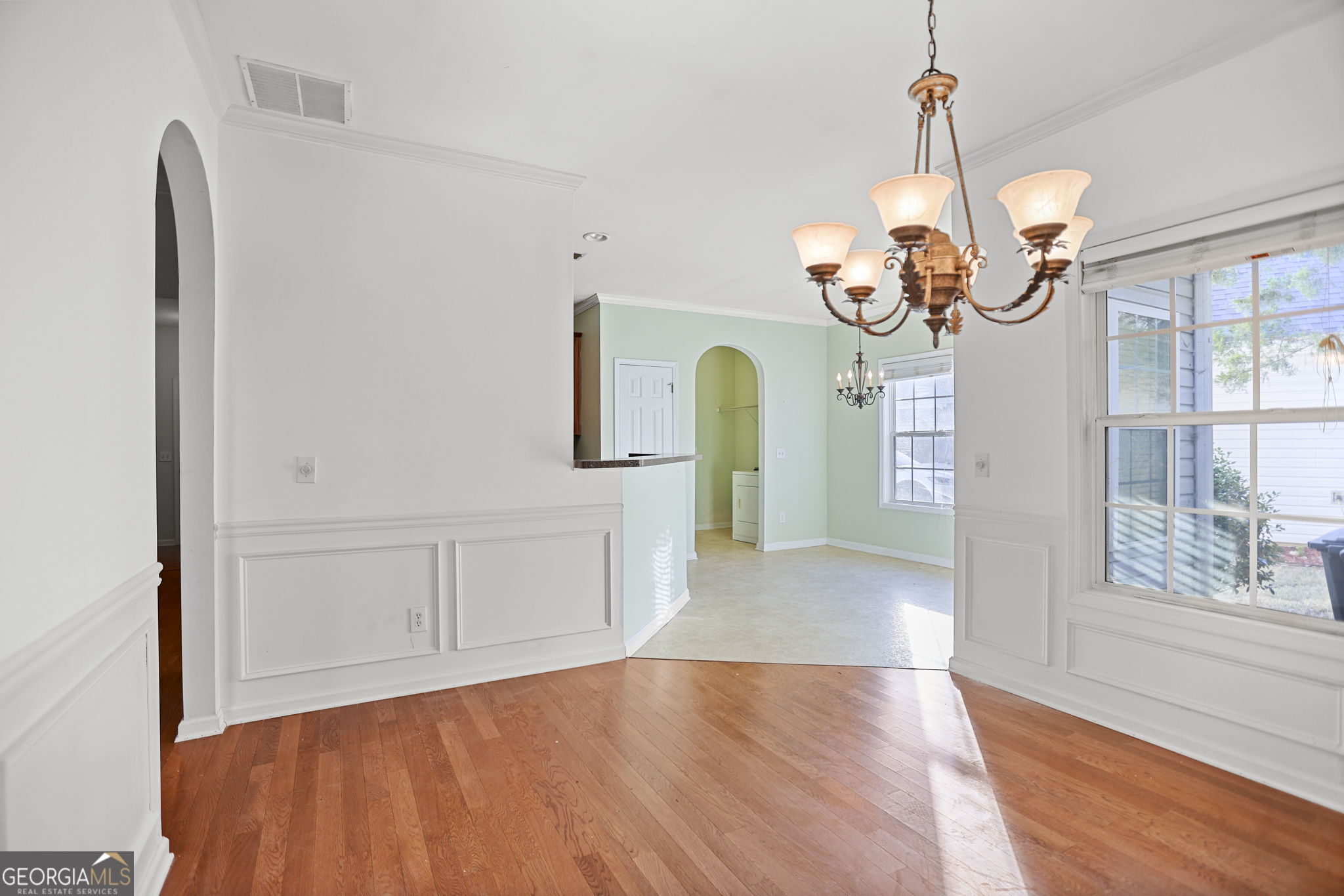 214 Meadow Run Carrollton, GA 30116 - Photo 22 of 44 a view of livingroom with chandelier