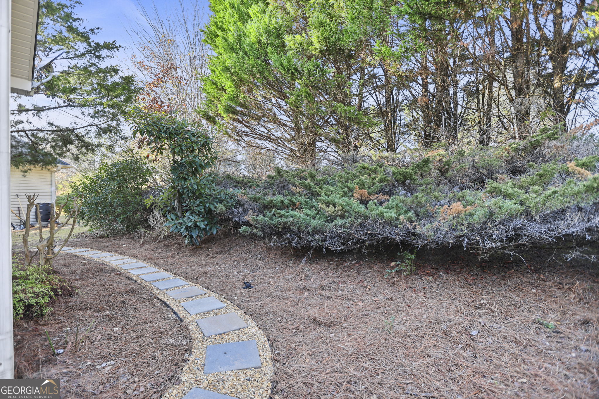 214 Meadow Run Carrollton, GA 30116 - Photo 43 of 44 a view of a yard with plants and trees