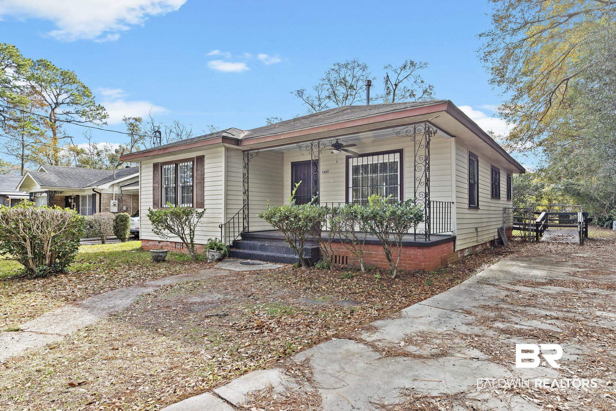 1665 Johnston Street Mobile, AL 36605 - Photo 2 of 17 View of front of property featuring covered porch