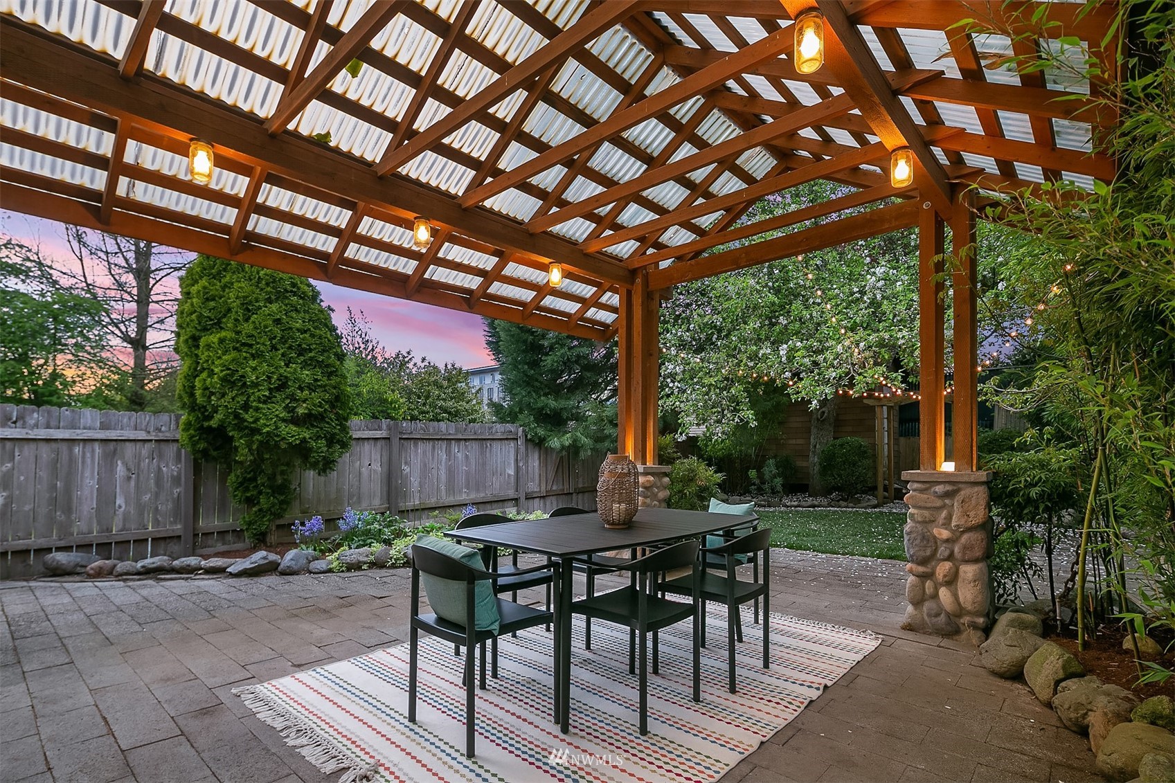 348 North 84th Street Seattle, WA 98103 - Photo 16 of 22 a view of a chairs and table in the patio