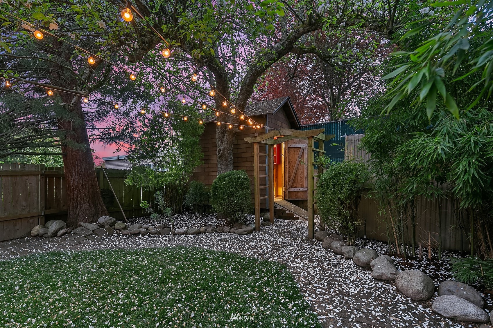 348 North 84th Street Seattle, WA 98103 - Photo 19 of 22 a house view with a sitting space and garden