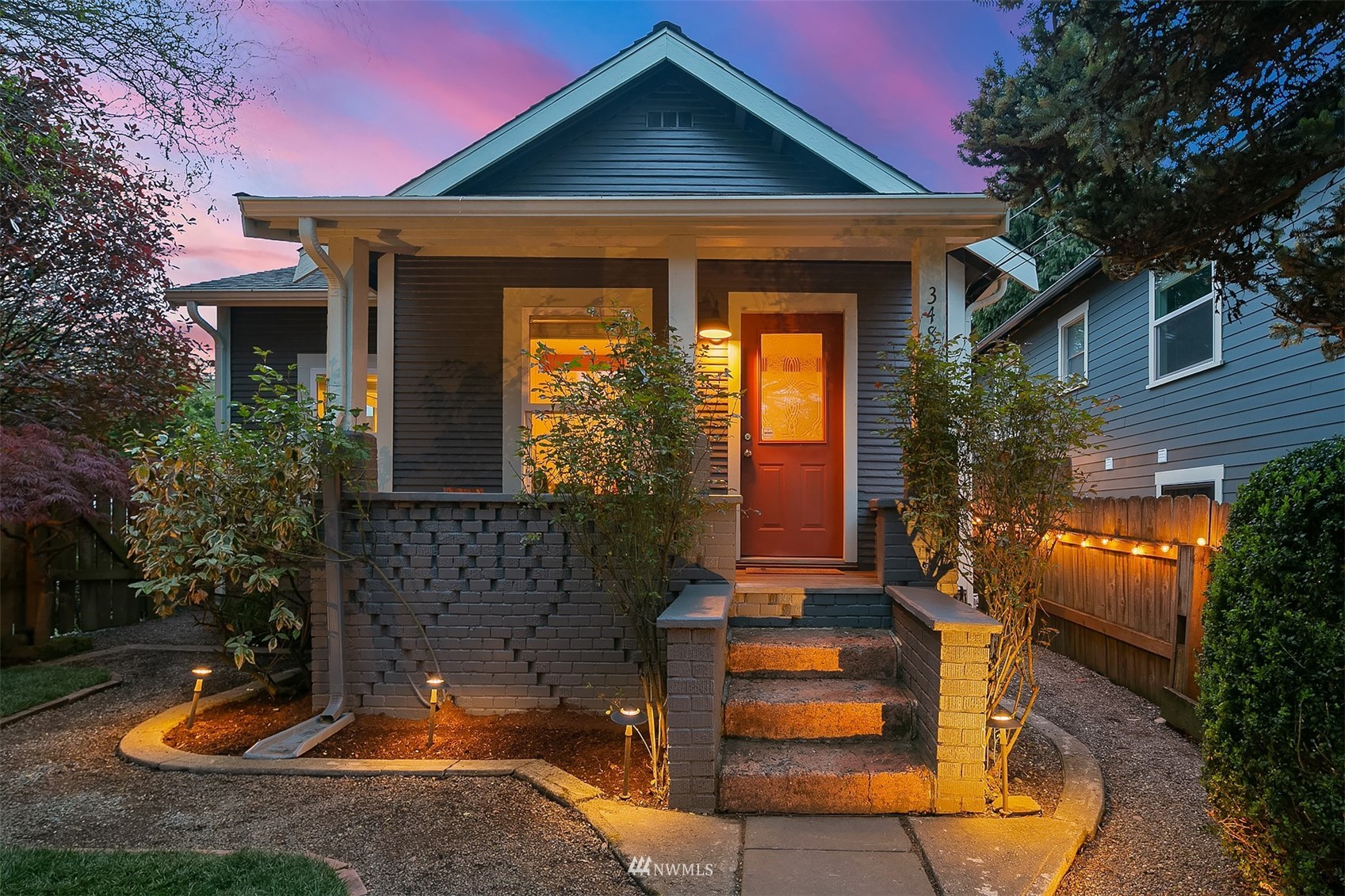 348 North 84th Street Seattle, WA 98103 - Photo 2 of 22 a front view of a house with garden