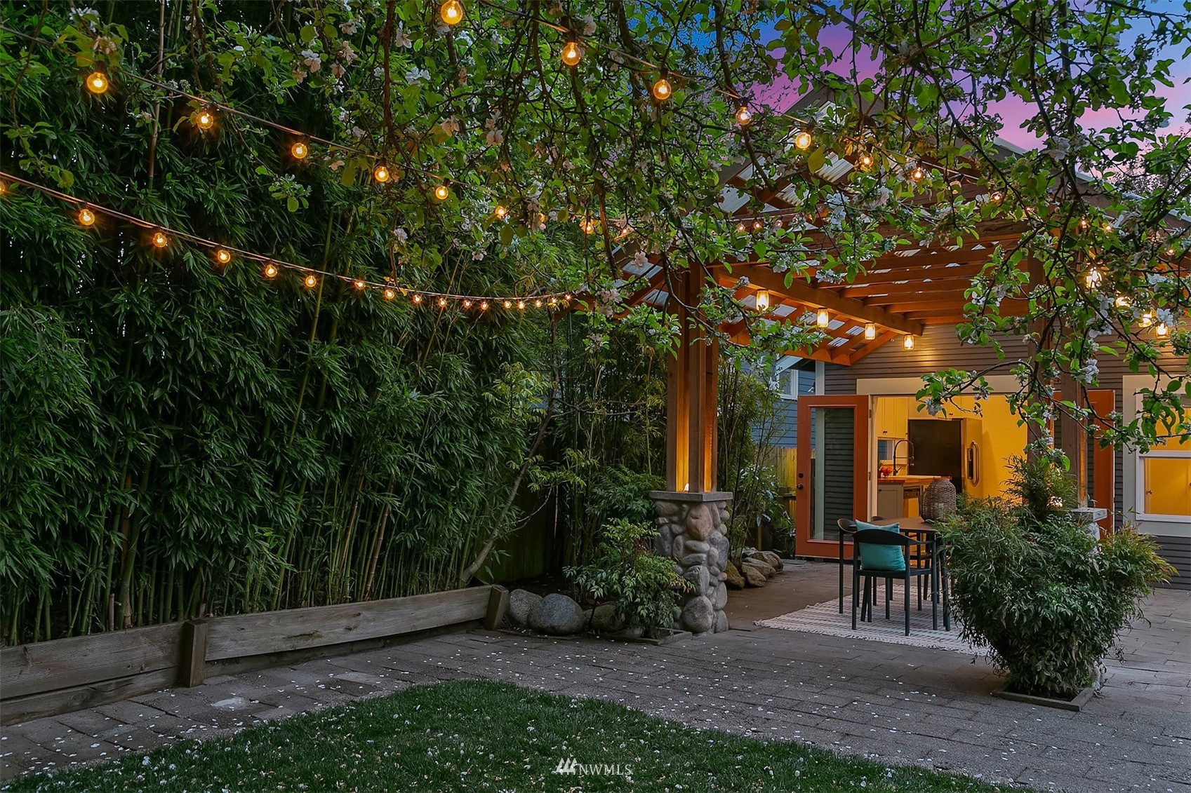 348 North 84th Street Seattle, WA 98103 - Photo 21 of 22 a view of a house with a yard and garden