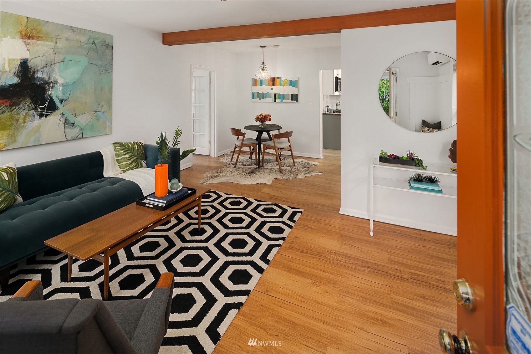 348 North 84th Street Seattle, WA 98103 - Photo 5 of 22 a bedroom with a bed and wooden floor
