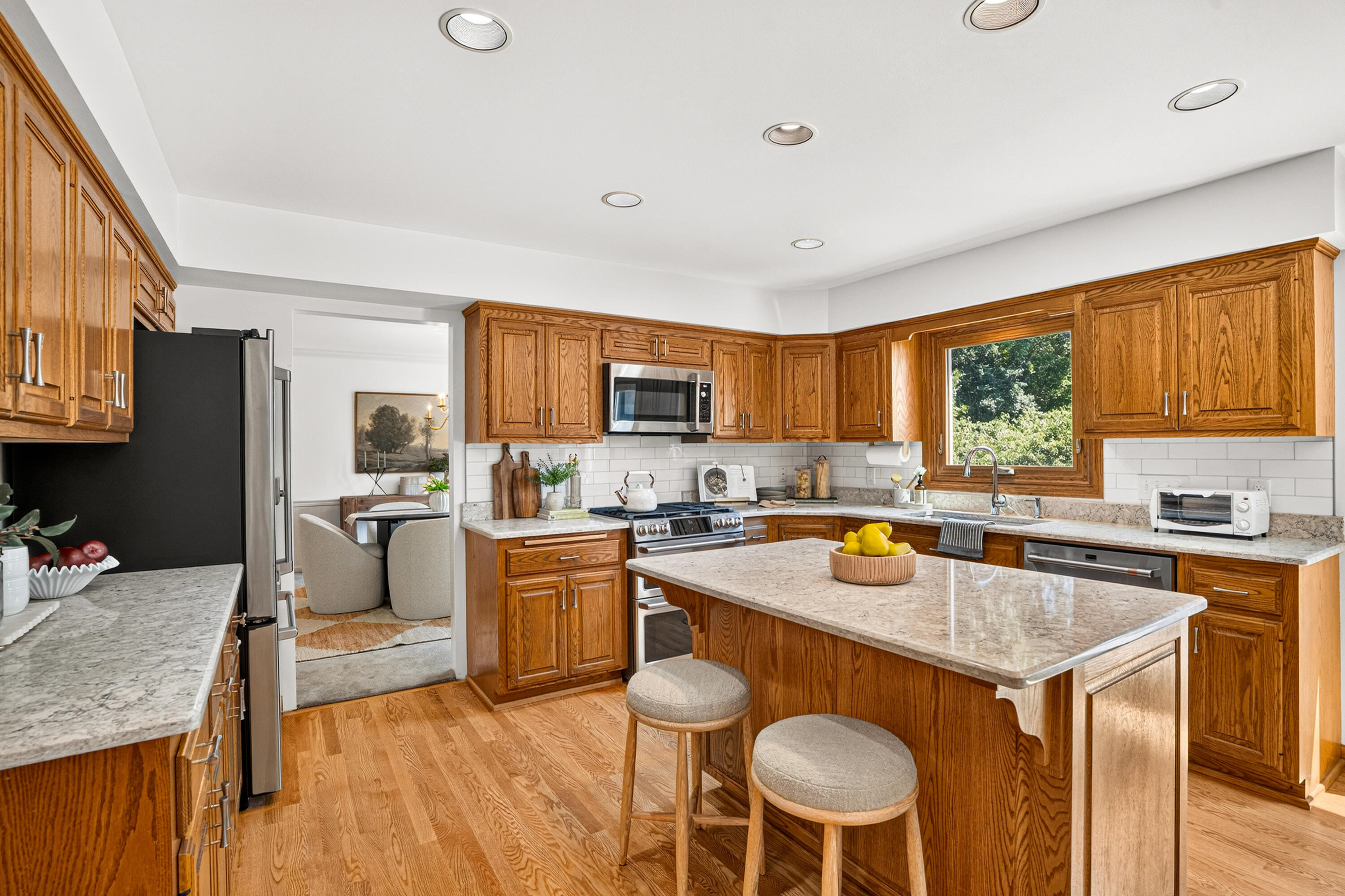 17445 St James Road Brookfield, WI 53045 - Photo 8 of 49 Kitchen w/ quartz counters, SS appliances & walk-in pantry