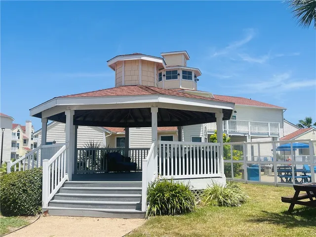 a front view of a house with a porch