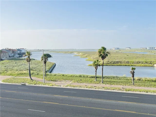 a view of a swimming pool and an ocean view