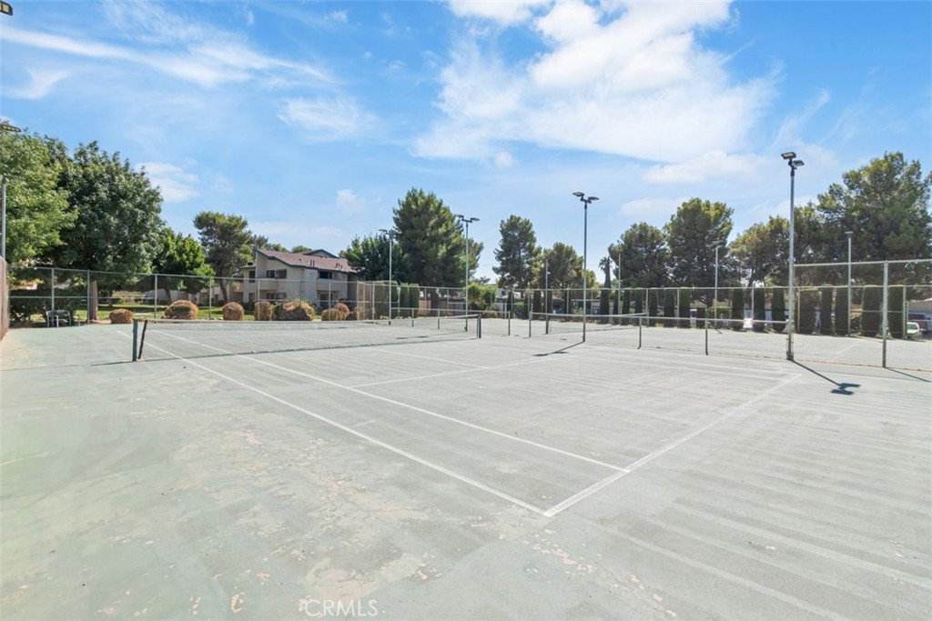 44544 15th Street East, Unit 9 Lancaster, CA 93535 - Photo 17 of 18 a view of a basket ball ground