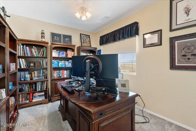 a room with furniture and a book shelf