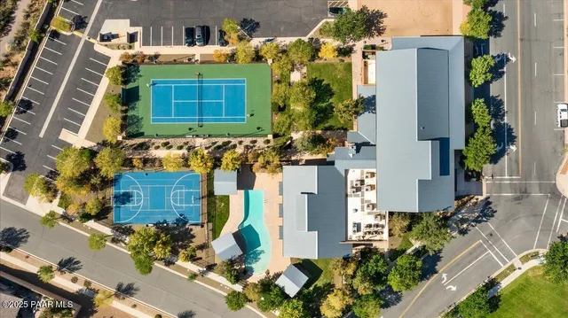 aerial view of a house with a yard and garden