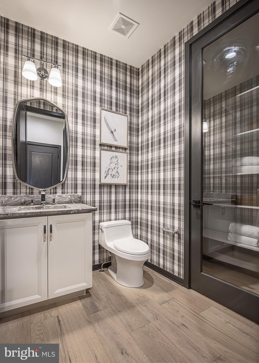 176 Alroy Road, Unit HOMESITE 242 Malvern, PA 19355 - Photo 18 of 19 a bathroom with a sink toilet and shower
