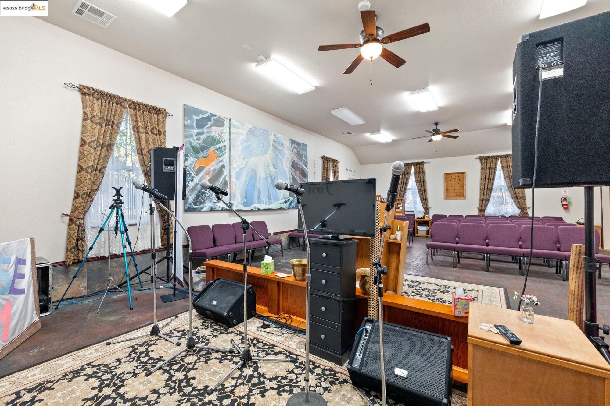 5033 Main Street Coulterville, CA 95311 - Photo 28 of 38 Office area with ceiling fan, plenty of natural light, and concrete floors