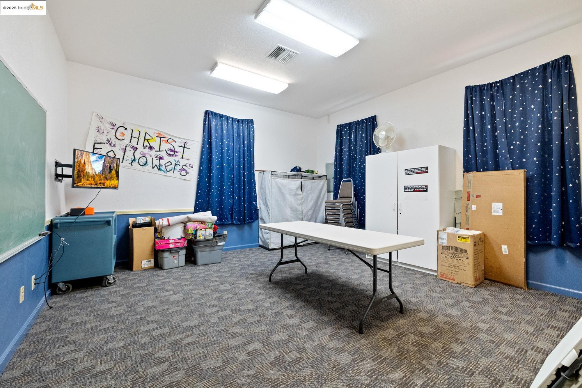 5033 Main Street Coulterville, CA 95311 - Photo 33 of 38 Carpeted office featuring baseboards and electric panel