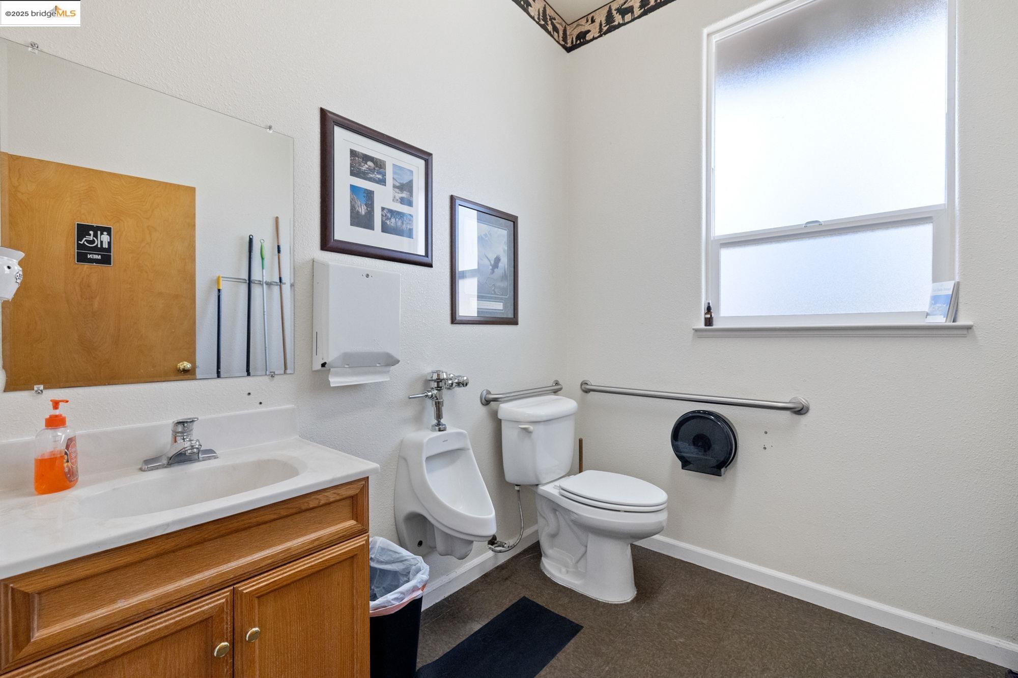 5033 Main Street Coulterville, CA 95311 - Photo 35 of 38 a bathroom with a sink and a toilet