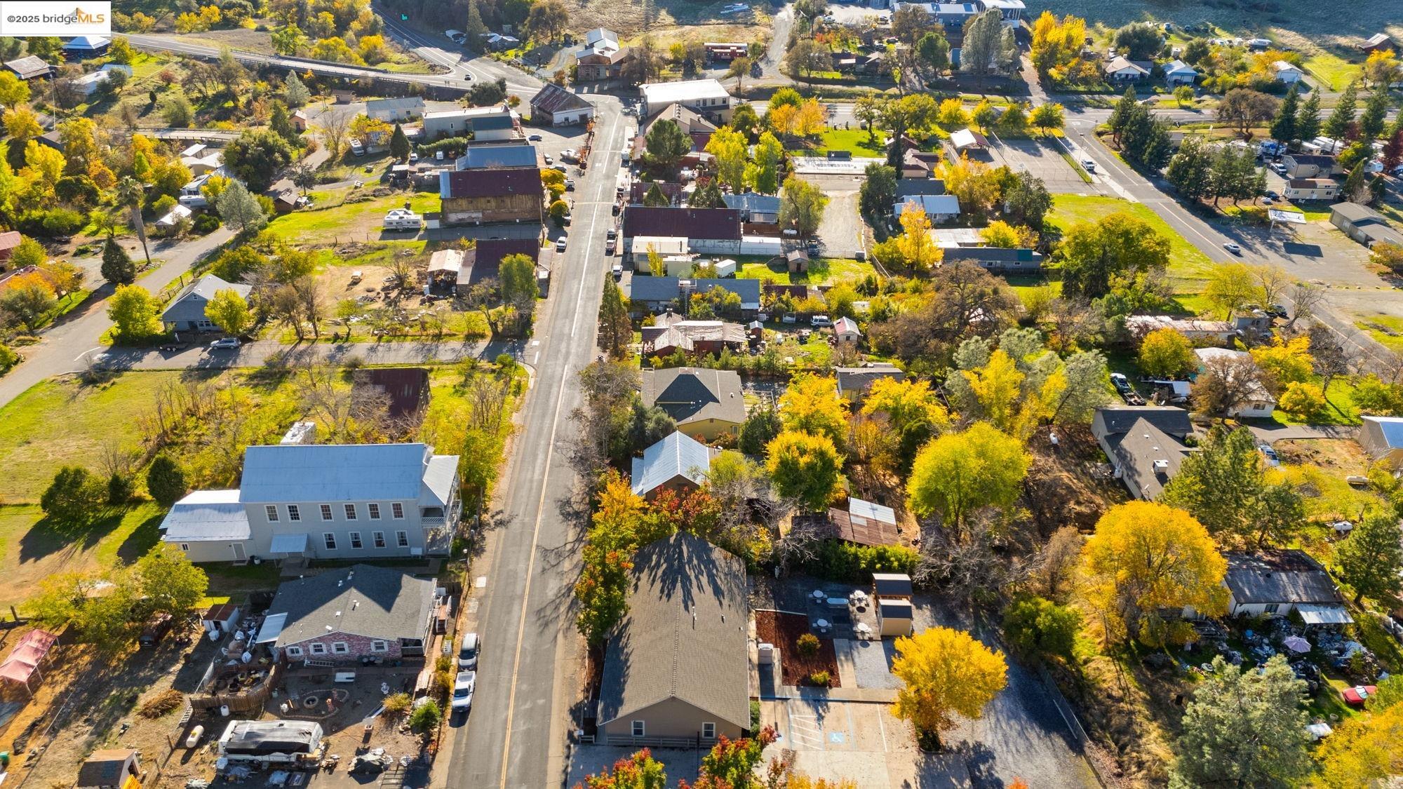 5033 Main Street Coulterville, CA 95311 - Photo 7 of 38 Aerial view of property's location with nearby suburban area