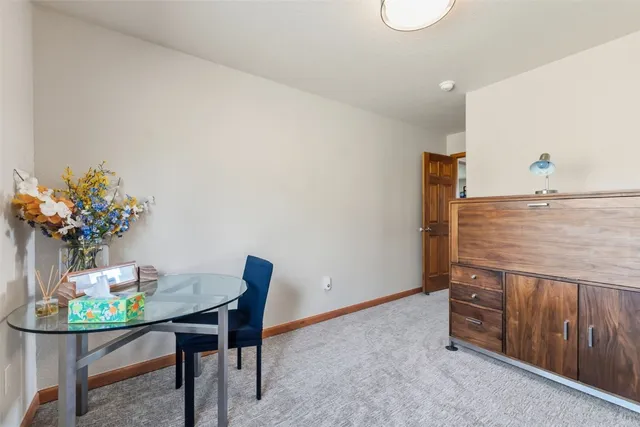 a view of a dining room with furniture