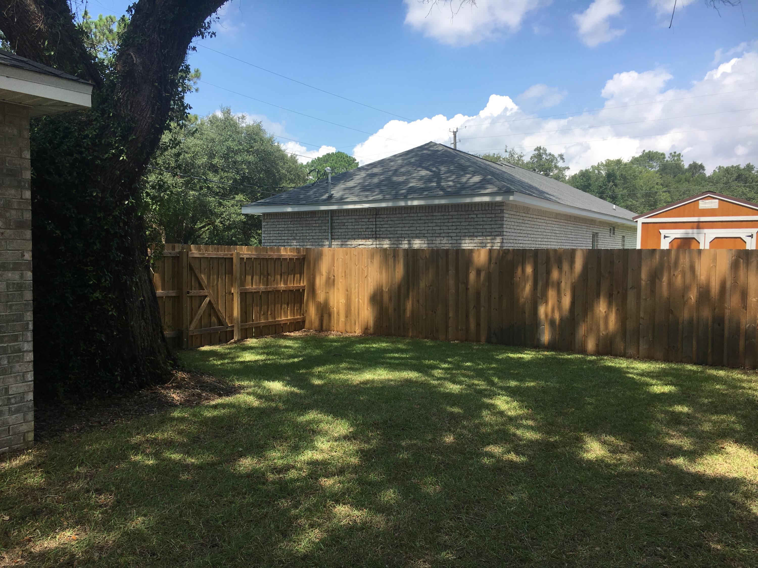 98 Eccles Road Fort Walton Beach, FL 32547 - Photo 23 of 27 Fenced backyard