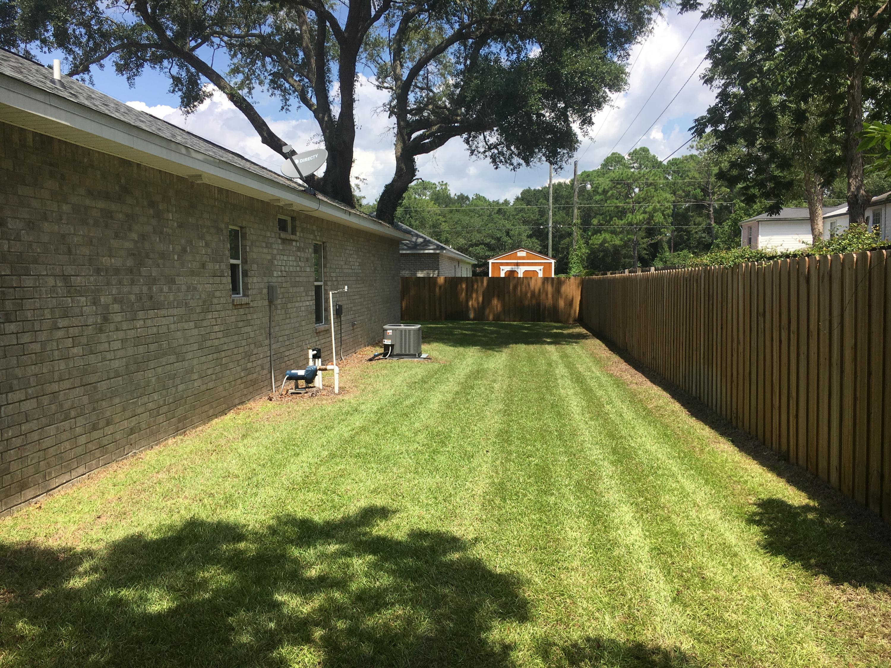 98 Eccles Road Fort Walton Beach, FL 32547 - Photo 24 of 27 Fenced backyard