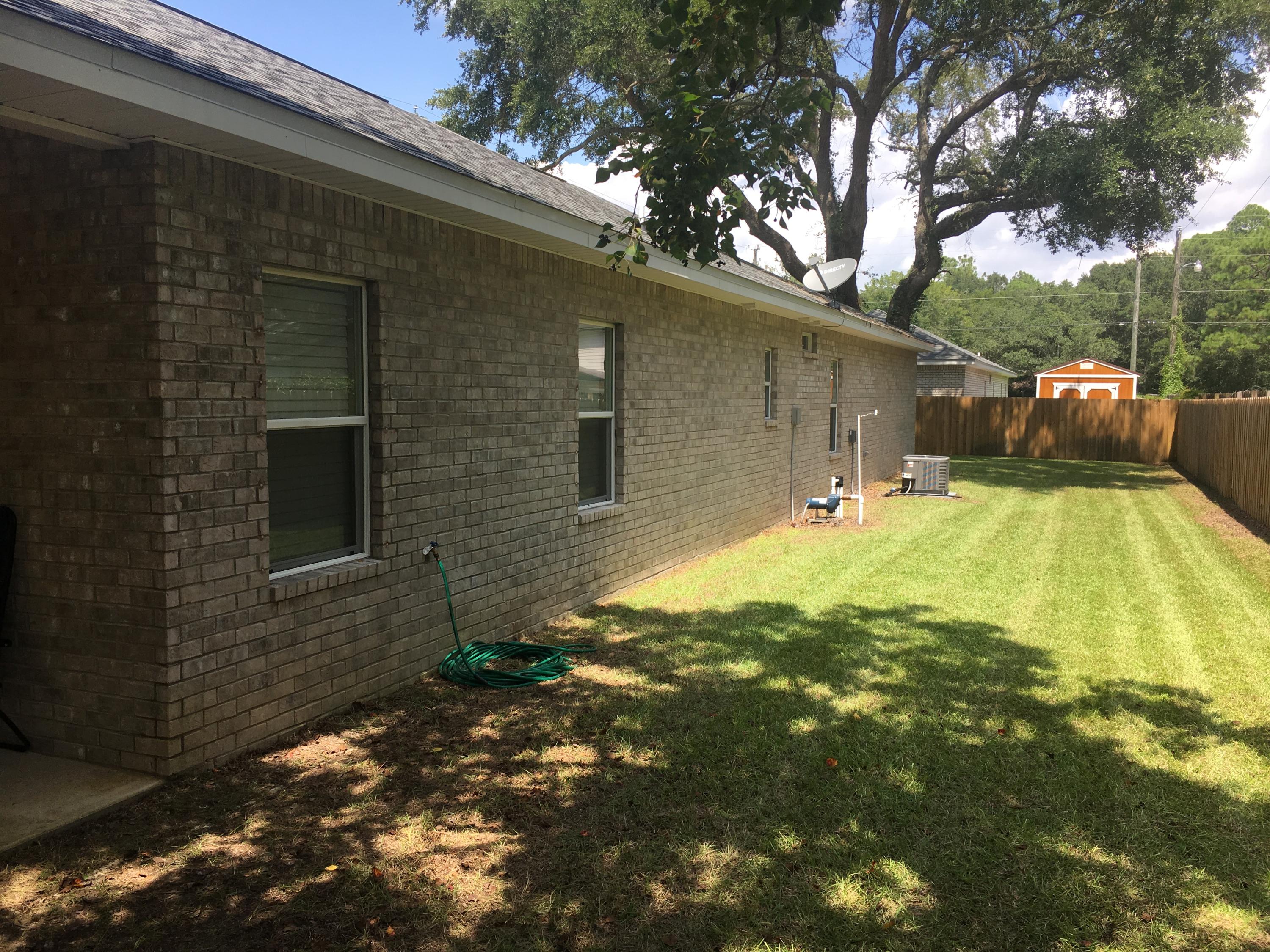 98 Eccles Road Fort Walton Beach, FL 32547 - Photo 25 of 27 Fenced backyard
