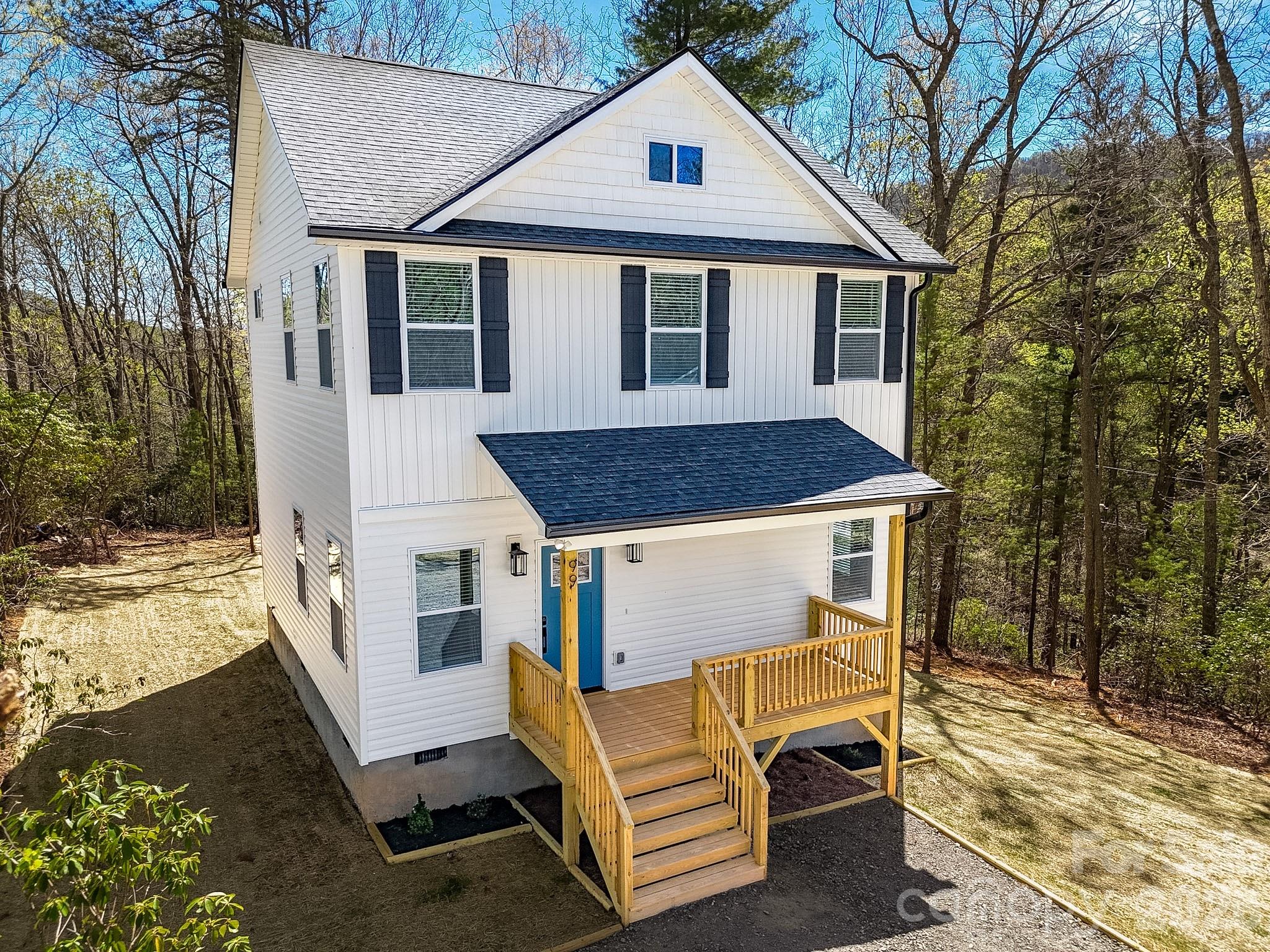 99 Lee Dotson Road Fairview, NC 28730 - Photo 4 of 47 a view of a house with backyard