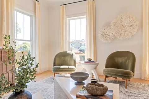 a bathroom with a sink vanity and mirror