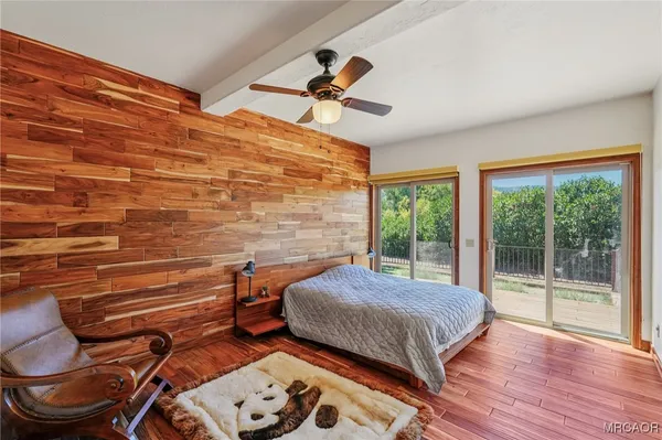 a room that has a dresser in it