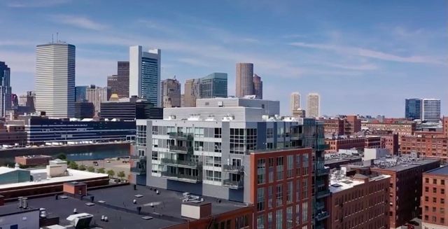 a view of a building with a tree