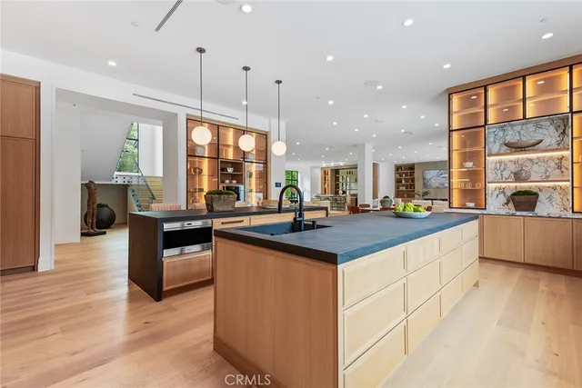 a kitchen with granite countertop a sink and counter space