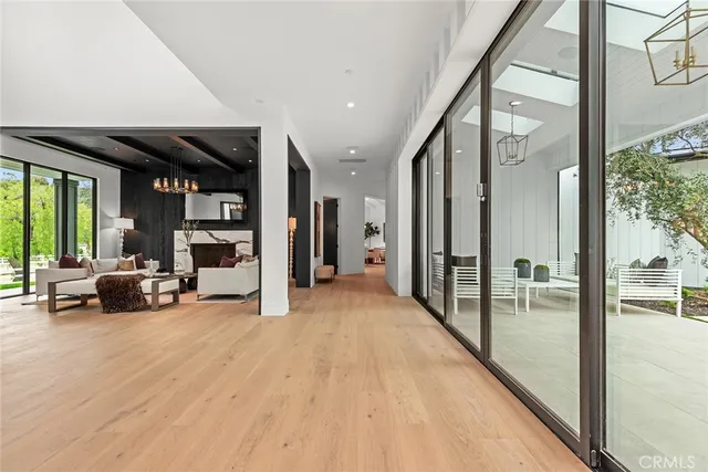 a view of a livingroom with furniture and a window